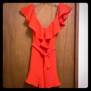 Red ruffle off the shoulder romper